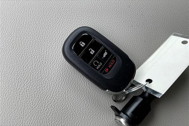 Photo of 2026 Radiant Red Metallic Honda CR-V
