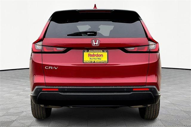 Photo of 2026 Radiant Red Metallic Honda CR-V