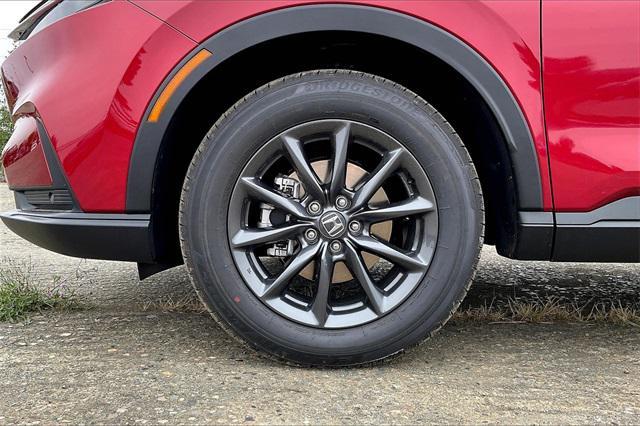 Photo of 2026 Radiant Red Metallic Honda CR-V