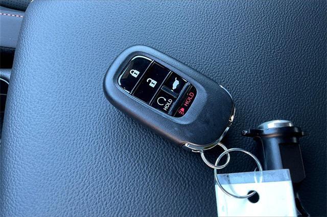 Photo of 2026 Radiant Red Metallic Honda CR-V Hybrid