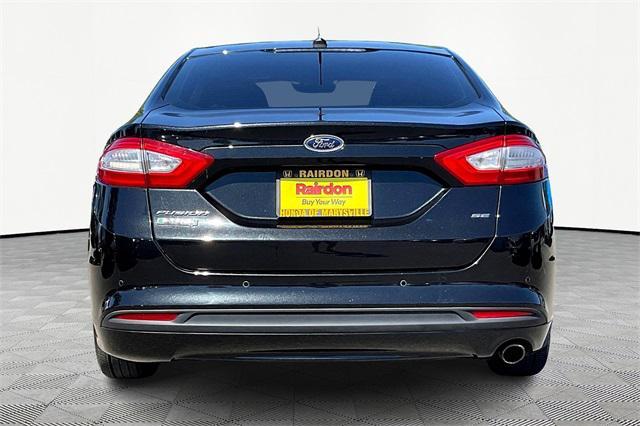 Photo of 2013 TUXEDO BLACK METALLIC Ford Fusion Energi