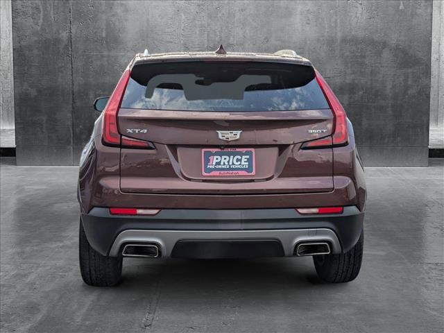 Photo of 2023 Rosewood Metallic Cadillac XT4