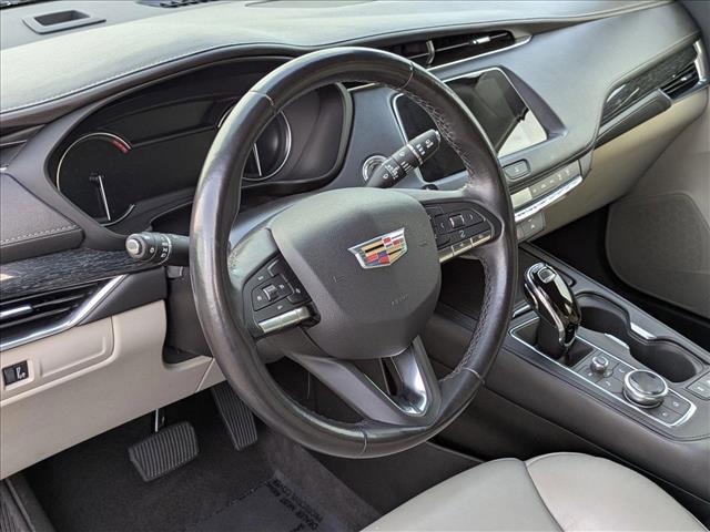 Photo of 2023 Rosewood Metallic Cadillac XT4