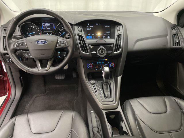 Photo of 2016 RUBY RED TINTED CLEARCOAT Ford Focus