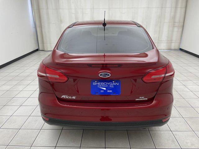 Photo of 2016 RUBY RED TINTED CLEARCOAT Ford Focus