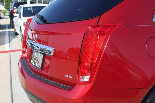 Photo of 2016 Crystal Red Tintcoat Cadillac SRX