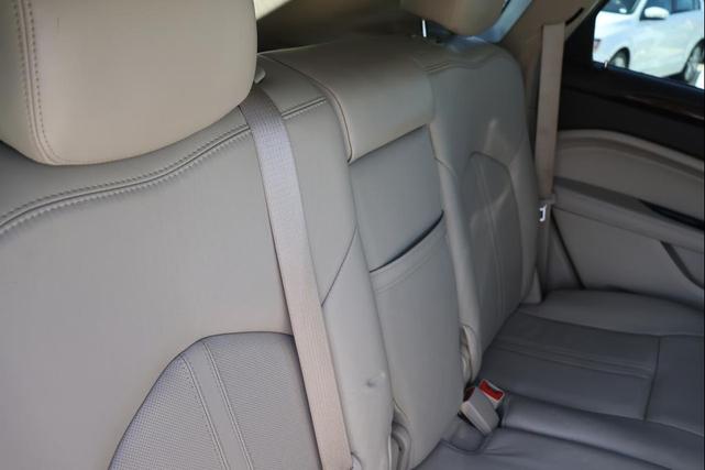 Photo of 2016 Crystal Red Tintcoat Cadillac SRX