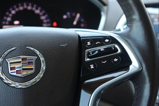 Photo of 2016 Crystal Red Tintcoat Cadillac SRX