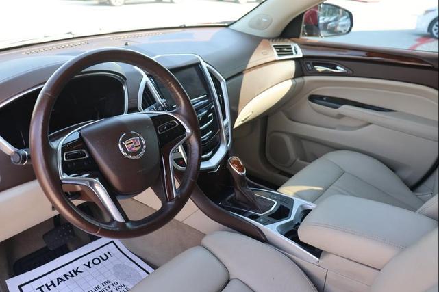 Photo of 2016 Crystal Red Tintcoat Cadillac SRX
