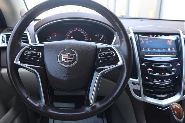 Photo of 2016 Crystal Red Tintcoat Cadillac SRX