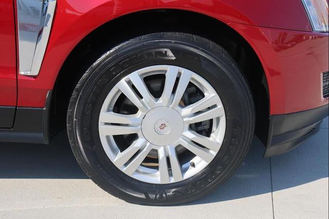 Photo of 2016 Crystal Red Tintcoat Cadillac SRX