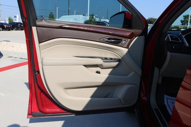 Photo of 2016 Crystal Red Tintcoat Cadillac SRX