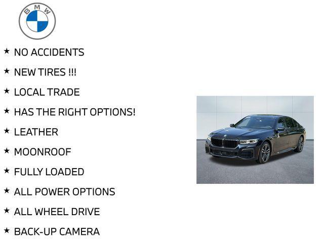 Photo of 2022 Carbon Black Metallic BMW 740