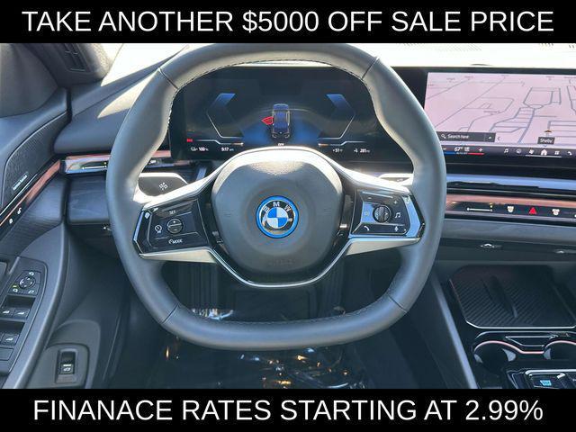 Photo of 2024 Black Sapphire Metallic BMW i5
