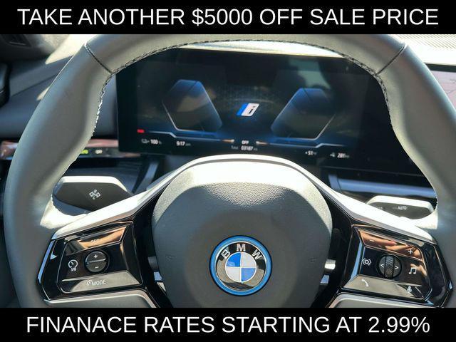Photo of 2024 Black Sapphire Metallic BMW i5
