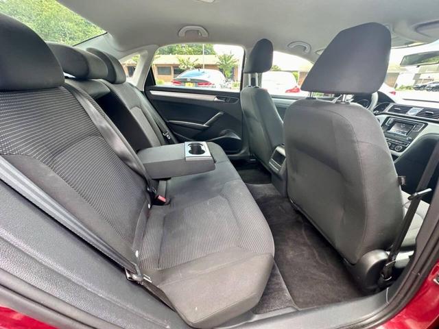 Photo of 2016 Fortana Red Volkswagen Passat