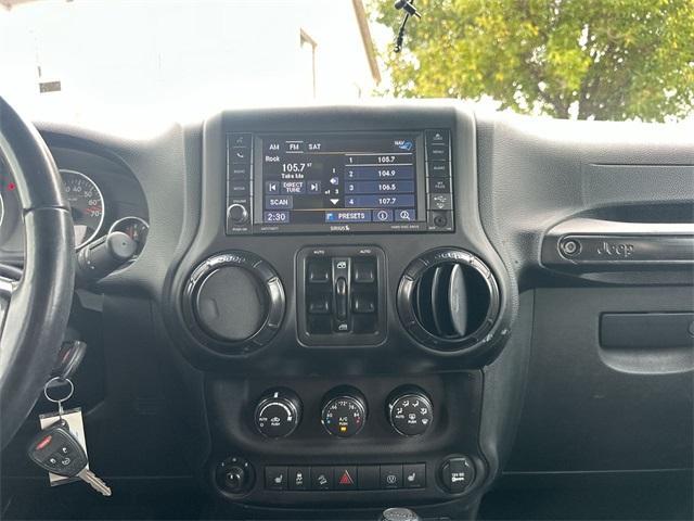 Photo of 2017 Black Clearcoat Jeep Wrangler Unlimited