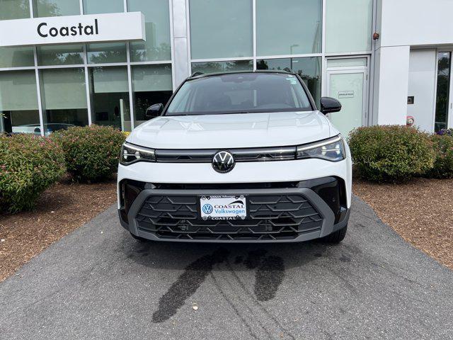 Photo of 2025 Pure White w/Deep Black Roof Volkswagen Taos