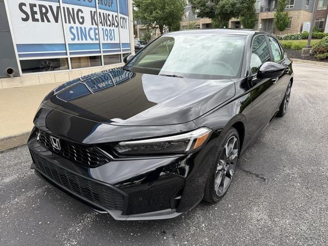 Photo of 2025 Still Night Pearl Honda Civic Hybrid