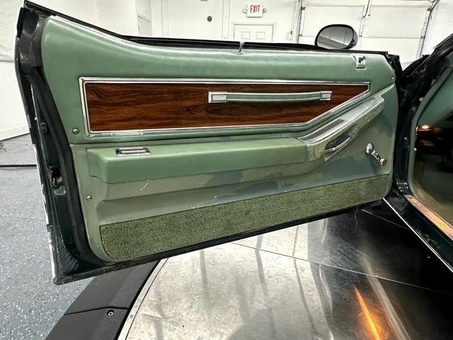 Photo of 1977 Green Pontiac Grand Prix
