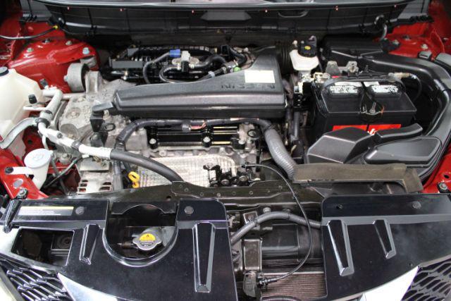 Photo of 2015 Cayenne Red Nissan Rogue