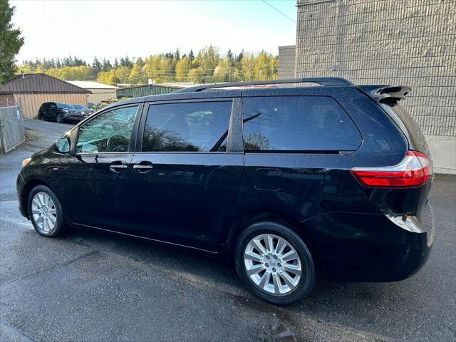 Photo of 2016 Midnight Black Metallic Toyota Sienna