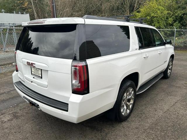 Photo of 2015 White GMC Yukon