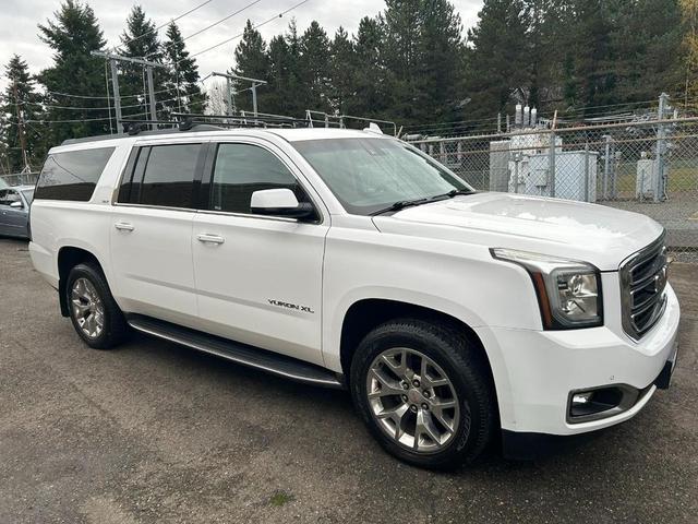 Photo of 2015 White GMC Yukon