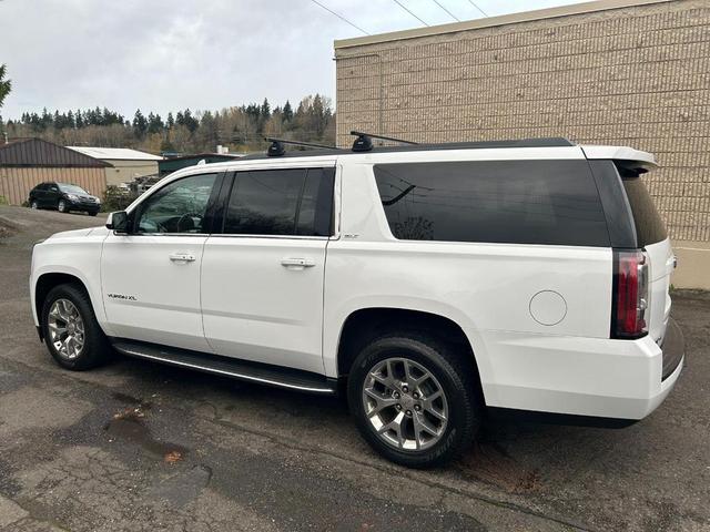 Photo of 2015 White GMC Yukon