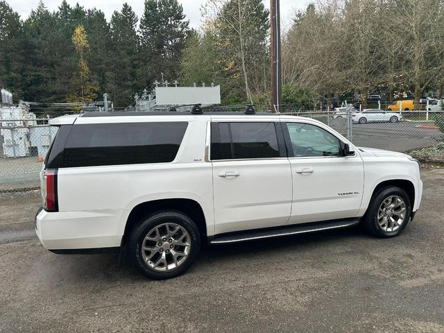Photo of 2015 White GMC Yukon