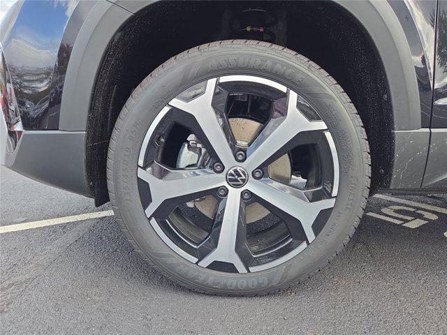 Photo of 2025 Deep Black Pearl Volkswagen Taos