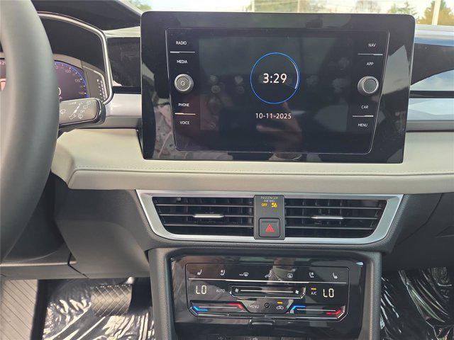 Photo of 2025 Deep Black Pearl Volkswagen Taos
