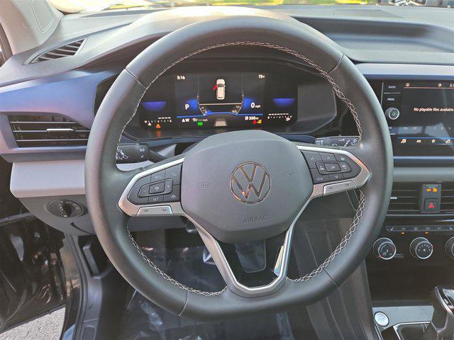 Photo of 2023 Deep Black Pearl Volkswagen Taos