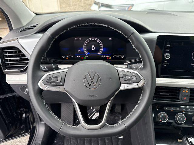 Photo of 2025 Deep Black Pearl Volkswagen Taos
