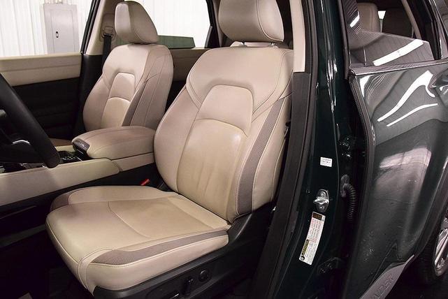 Photo of 2023 Obsidian Green Nissan Pathfinder