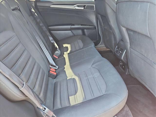 Photo of 2017 Ruby Red Metallic Tinted Clearcoat Ford Fusion Hybrid