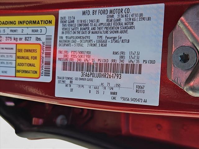Photo of 2017 Ruby Red Metallic Tinted Clearcoat Ford Fusion Hybrid
