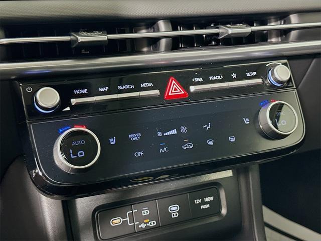 Photo of 2025 White Pearl Hyundai TUCSON Hybrid