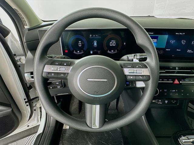 Photo of 2025 White Pearl Hyundai TUCSON Hybrid
