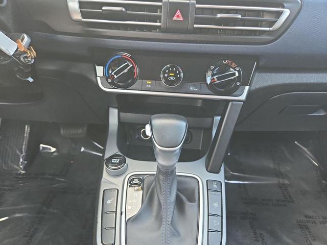 Photo of 2021 Mars Orange Kia Seltos