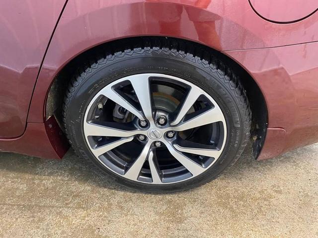 Photo of 2016 Burgundy Nissan Maxima