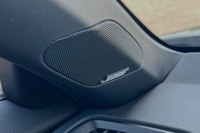 Photo of 2025 Boost Blue Pearl Honda Civic Hybrid