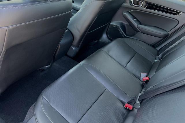 Photo of 2025 Boost Blue Pearl Honda Civic Hybrid