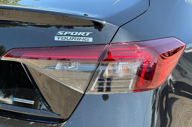 Photo of 2025 Boost Blue Pearl Honda Civic Hybrid