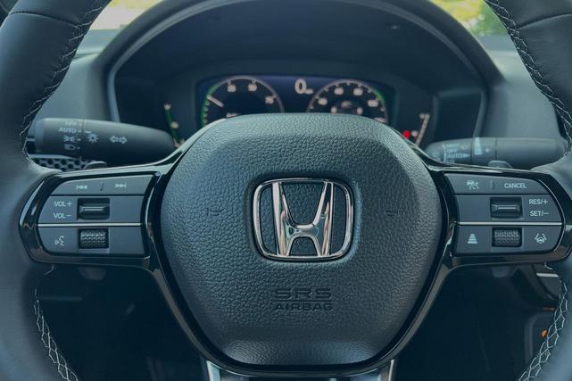 Photo of 2025 Boost Blue Pearl Honda Civic Hybrid