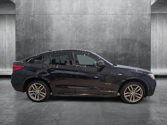 Photo of 2016 Deep Sea Blue Metallic BMW X4