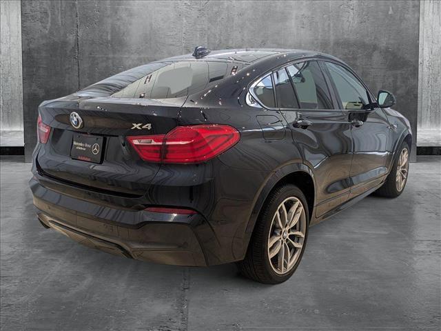 Photo of 2016 Deep Sea Blue Metallic BMW X4