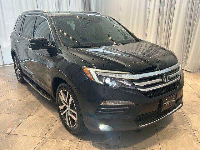 Photo of 2016 Black Honda Pilot
