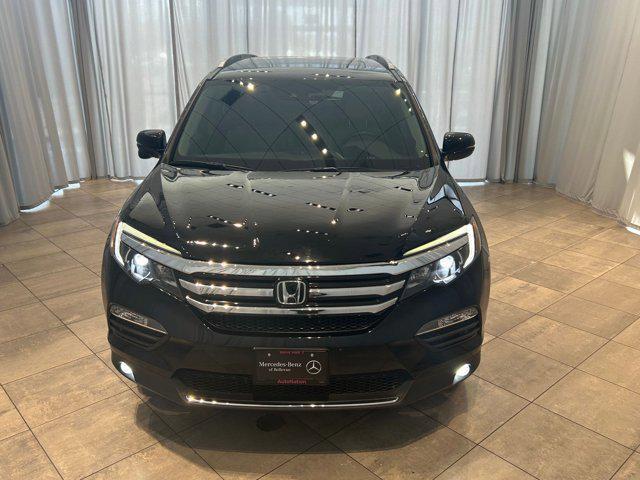 Photo of 2016 Black Honda Pilot