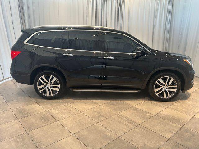Photo of 2016 Black Honda Pilot
